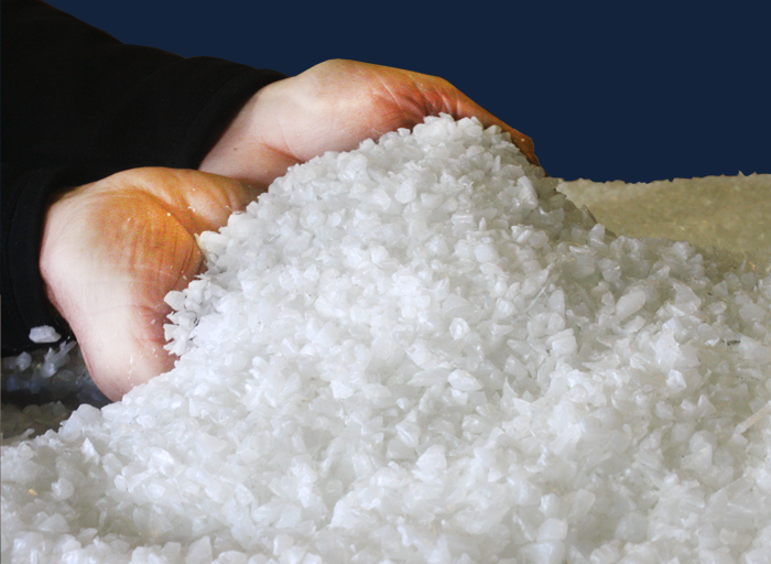 Plastic Granulation at Industrial Resource Network Holding granulated plastic bits